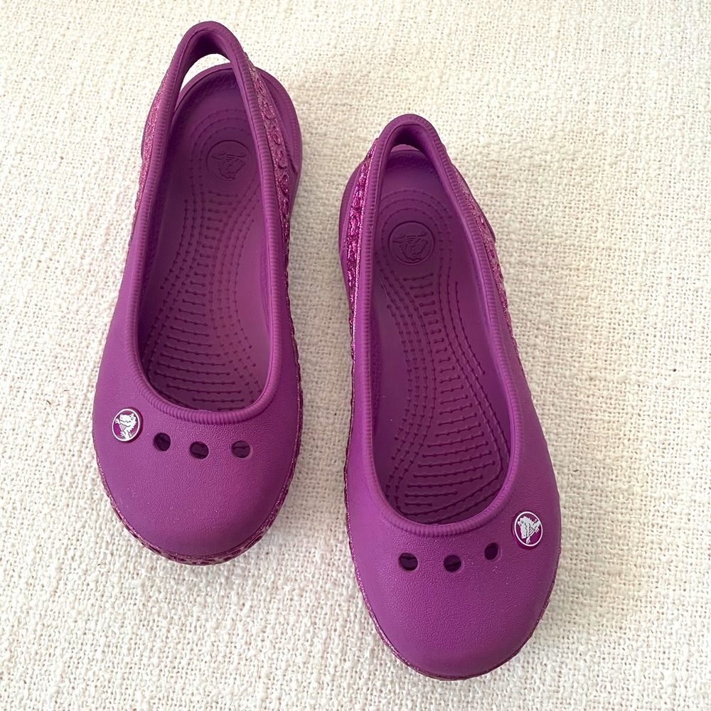 Girl’s purple Croc sandals